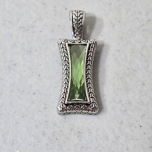 Elegant Silver Pendant with Green Gemstone